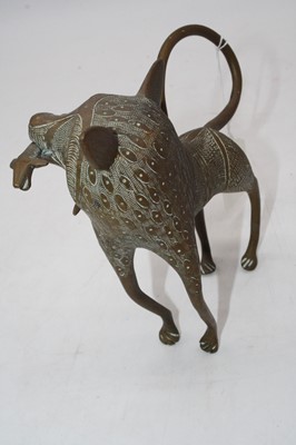 Lot 34 - An eastern brass model of an animal, 7cm high