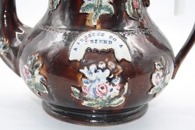 Lot 38 - A Victorian bargeware teapot, inscribed "A...
