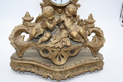 Lot 59 - A 19th century French gilt metal mantel clock,...