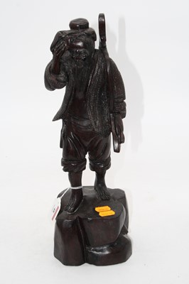Lot 48 - A modern figure carved as a Japanese man in...
