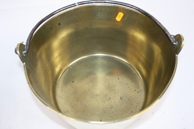 Lot 99 - A Victorian brass preserve pan with iron swing...