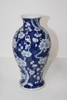 Lot 109 - A Chinese export blue & white vase of baluster...