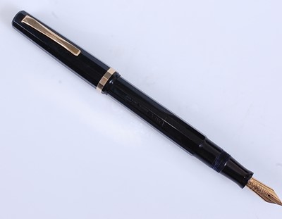 Lot 77 - An Omas Extra fountain pen, of black faceted...