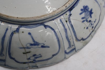 Lot 123 - A 19th century Delft bowl on a pale blue...
