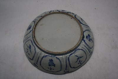 Lot 123 - A 19th century Delft bowl on a pale blue...