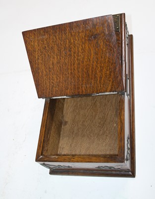 Lot 156 - A 1920s oak table cigarette box, having...