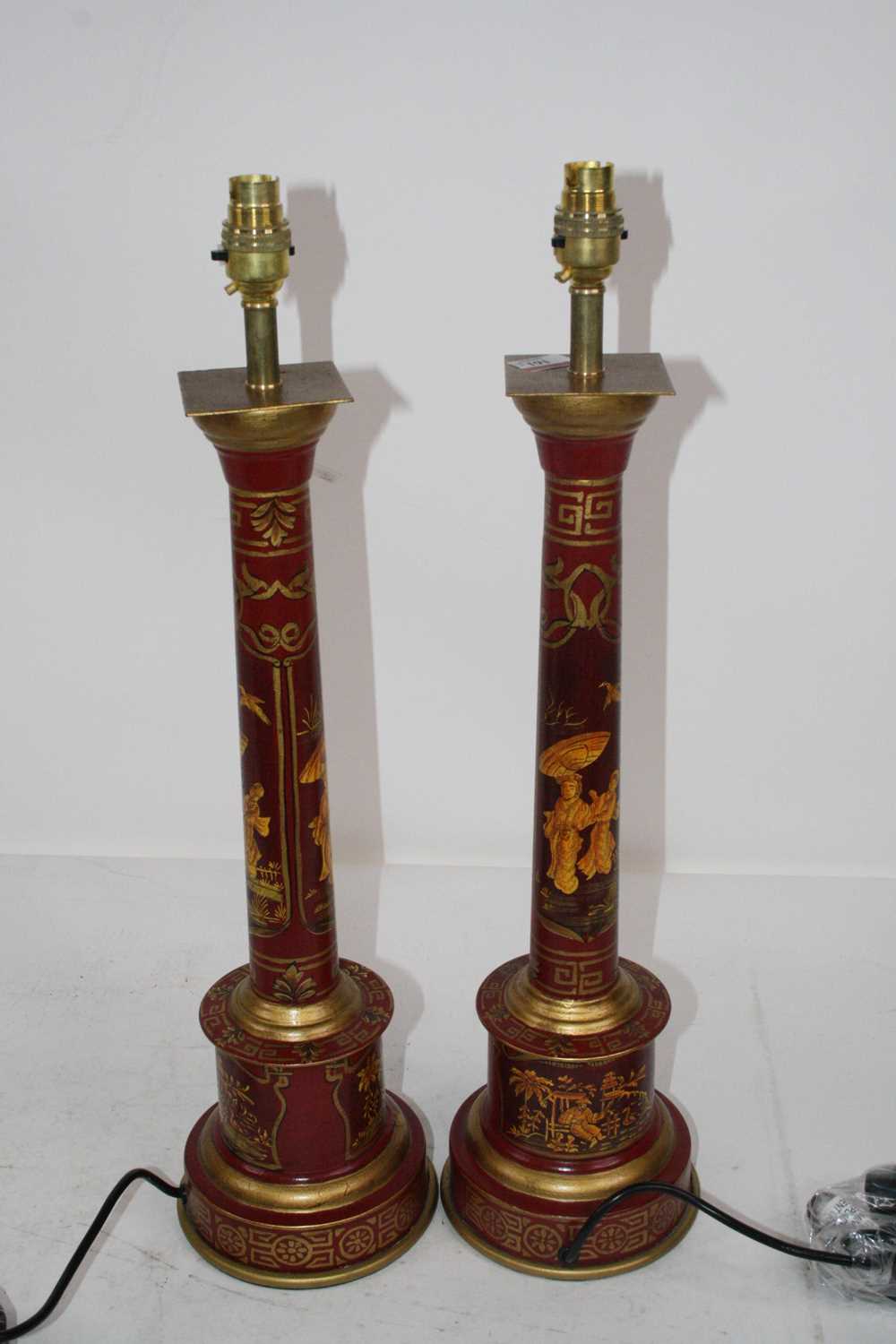 Lot 161 - A pair of reproduction red painted and...