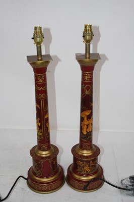 Lot 161 - A pair of reproduction red painted and...
