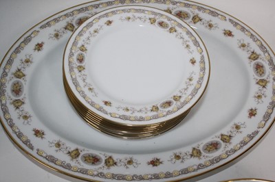 Lot 165 - A Noritake eight-place setting dinner service...