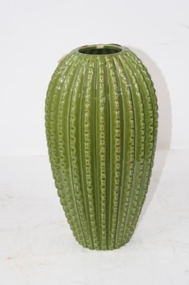 Lot 147 - A large green glazed ceramic vase of cactus...