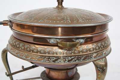 Lot 149 - A 20th century eastern copper saucepan on...
