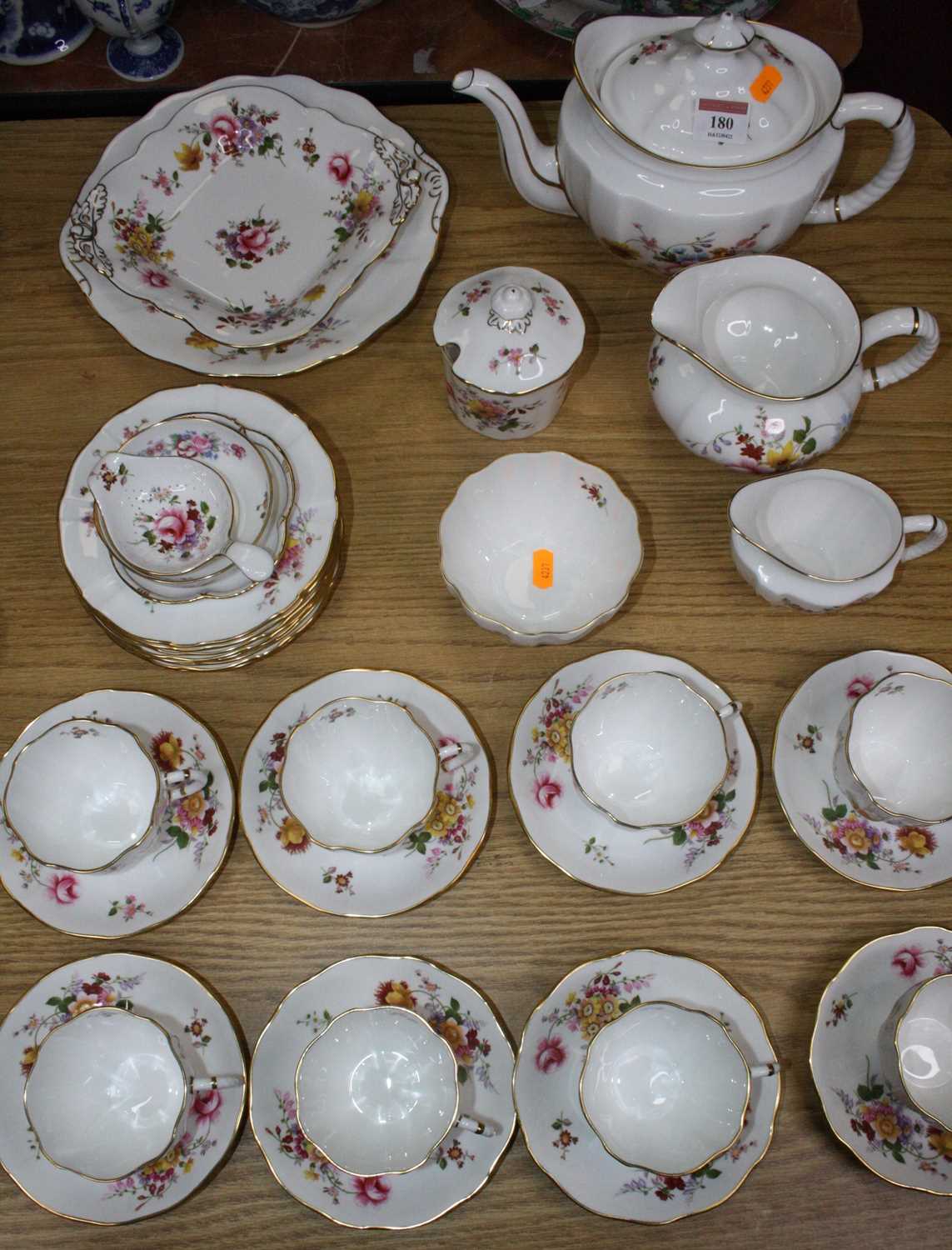 Lot 180 - A Royal Crown Derby eight-place setting tea...