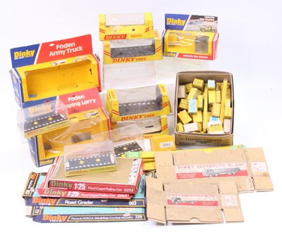 Lot 1098 - A large quantity of Dinky Toys empty, damaged...