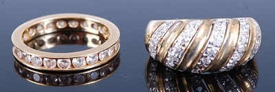 Lot 2593 - Two rings, being an 18ct yellow gold full hoop...