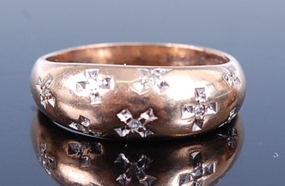 Lot 2590 - A 9ct yellow gold diamond set dress ring,...
