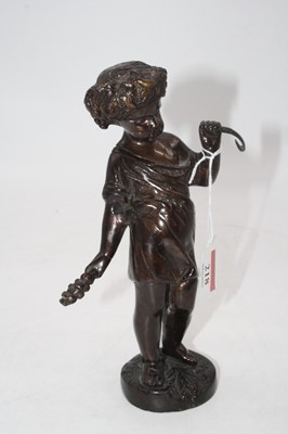 Lot 218 - A bronze figure in the form of a girl in...