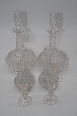 Lot 220 - A pair of cut glass decanters and stoppers,...