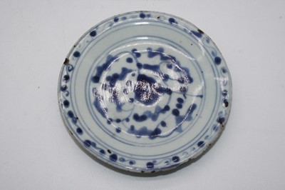 Lot 231 - A Chinese blue glazed stem vase (drilled),...