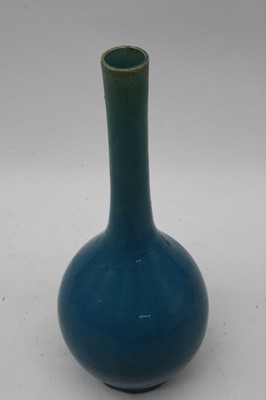 Lot 231 - A Chinese blue glazed stem vase (drilled),...