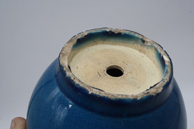 Lot 231 - A Chinese blue glazed stem vase (drilled),...