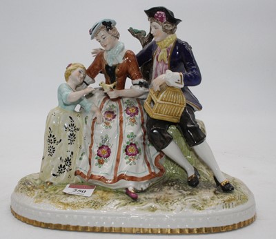 Lot 250 - An early 20th century porcelain figure group,...