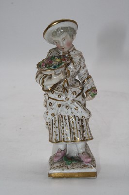 Lot 254 - A 19th century continental porcelain figure of...