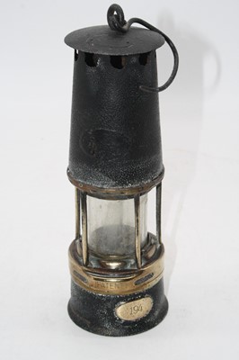 Lot 261 - An early 20th century miner's safety lamp, the...