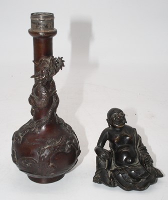 Lot 273 - A Chinese bronze vase, having a slender neck...