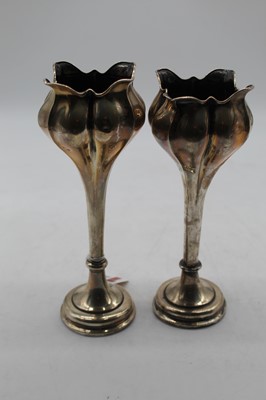 Lot 294 - A matched pair of Edwardian silver spill vases,...