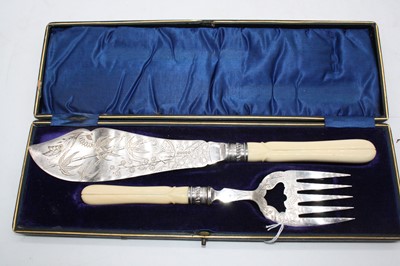 Lot 305 - A pair of Victorian fish servers, the knife...
