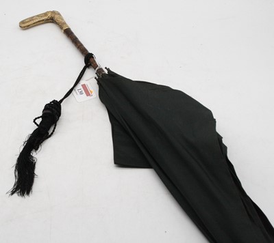 Lot 130 - An Edwardian lady's parasol, having a cotton...