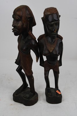 Lot 287 - A pair of Afican carved hardwood figures, 46cm...