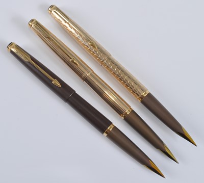 Lot 83 - Three Parker 50 Falcon fountain pens, in Gold,...