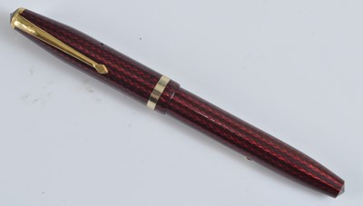 Lot 18 - A Conway Stewart 85L fountain pen, in red...
