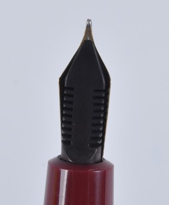 Lot 51 - A Parker Duofold fountain pen, in deep red...