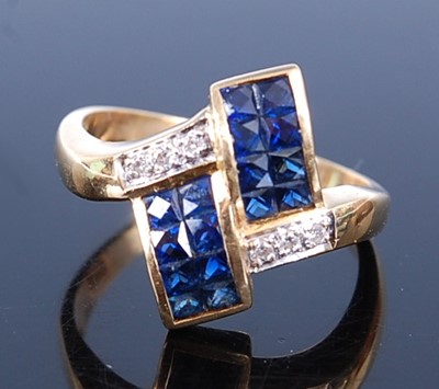 Lot 2628 - A yellow metal, sapphire and diamond crossover...