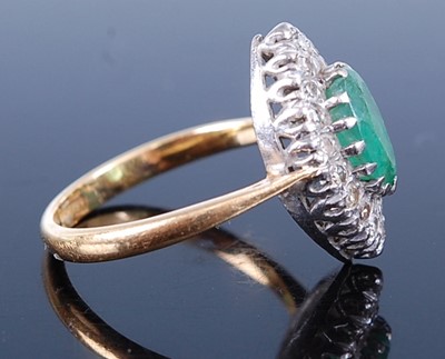 Lot 2625 - A yellow and white metal, emerald and diamond...