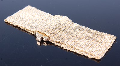 Lot 2633 - A 9ct yellow and white gold flat meshlink...