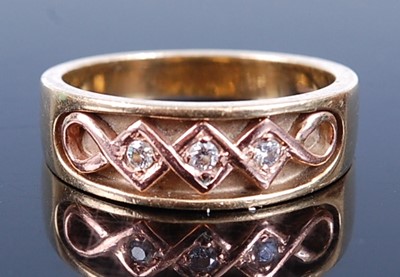 Lot 2600 - A 9ct yellow and rose gold Clogau ring,...