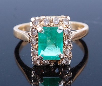 Lot 2613 - An 18ct gold, emerald and white hardstone ring,...
