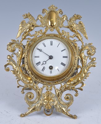 Lot 40 - A Victorian brass strut clock, having an...
