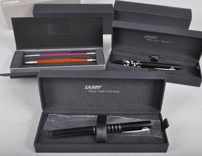 Lot 80 - Four Lamy pens, being one fountain and three...