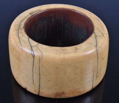 Lot 400 - An early 20th century African ivory bangle, of...