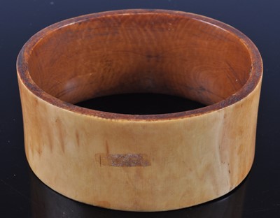 Lot 400 - An early 20th century African ivory bangle, of...