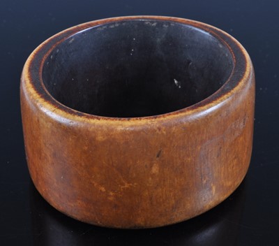 Lot 400 - An early 20th century African ivory bangle, of...