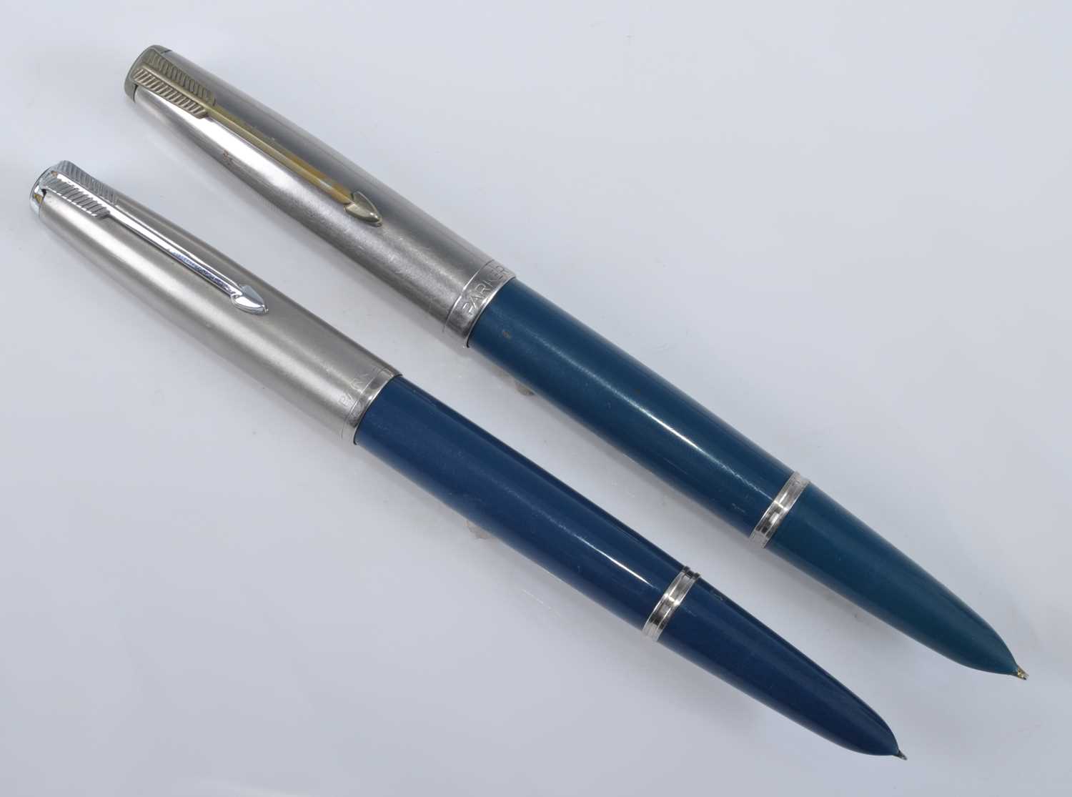Lot 94 - Two Parker 51 fountain pens, in teal with...