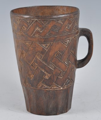 Lot 2395 - A Ceremonial wooden palm wine cup, the...