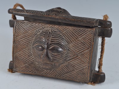 Lot 2399 - A wooden divination box and cover, of...