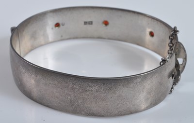 Lot 2637 - A Victorian style silver hinged bangle, one...