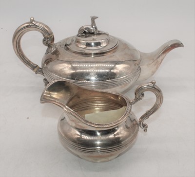 Lot 251 - A Victorian silver teapot and cream jug, each...